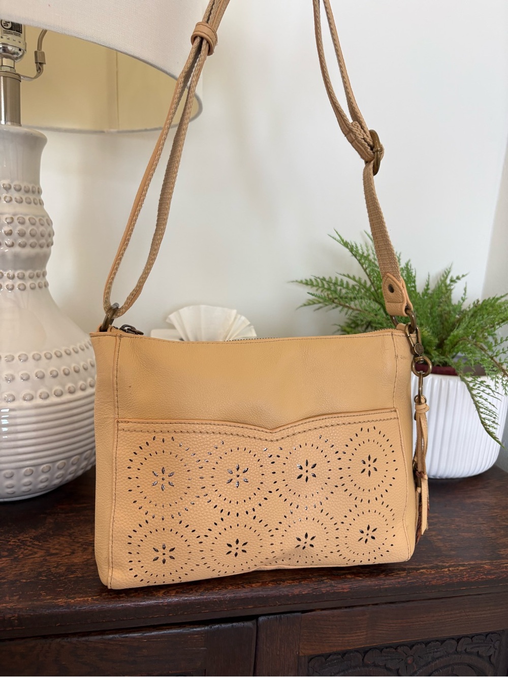 The Sak Classic Yellow Tan Leather Crossbody Bag with Laser-Cut Detail